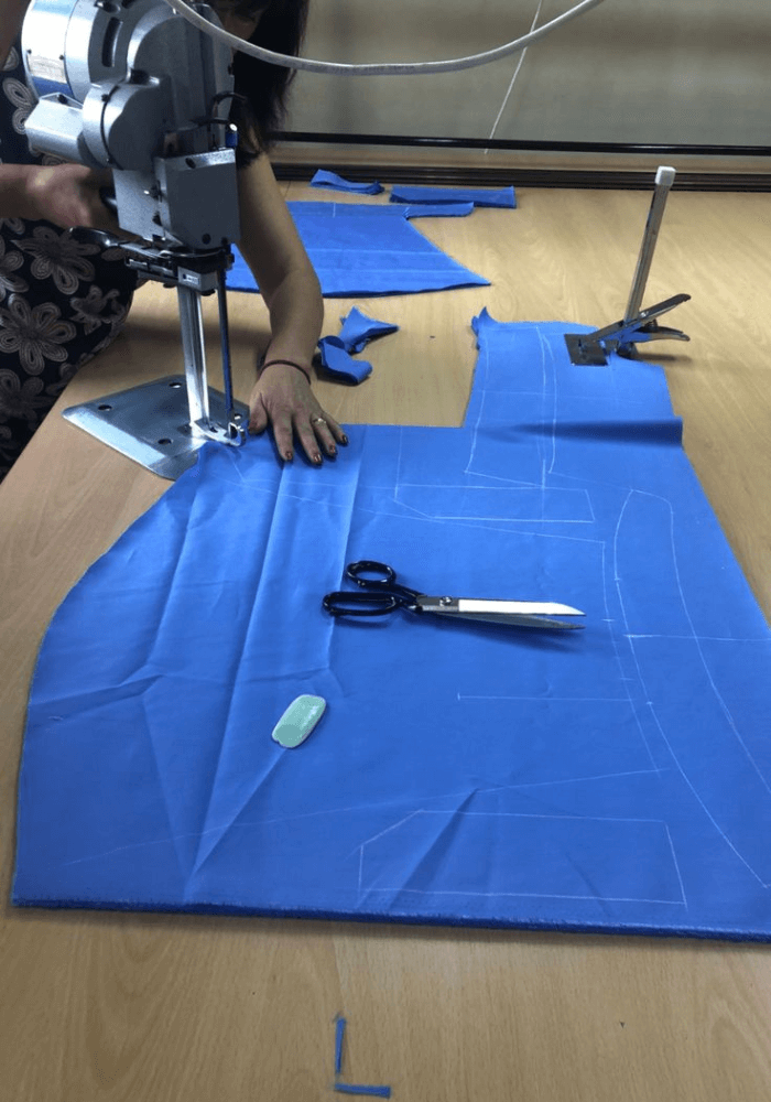 Fabric Cutting Process At x Athletic Wear The Leading Sportswear Manufacturer