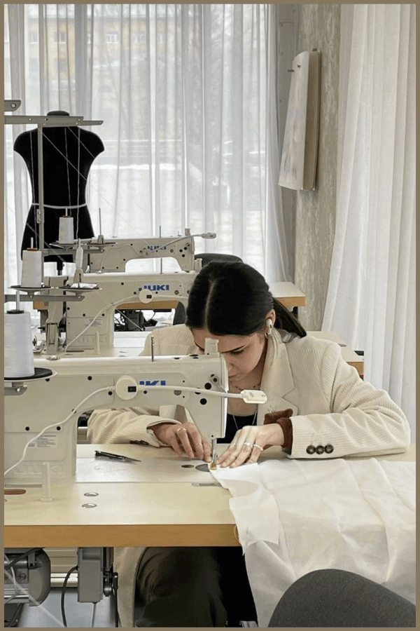 A Young Girl While Sample Fitness Clothing Manufacturing