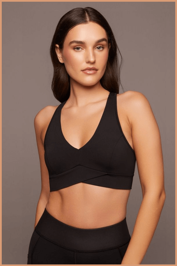 Young Lady Wear Stylish Athletic Bra Manufactured By The Custom Athletic Wear Manufacturer