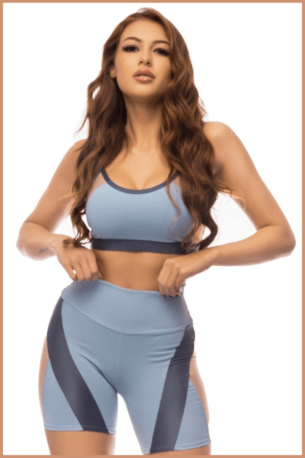 A Young Girl Posing Sample Athletic Dress At X Athletic Wear