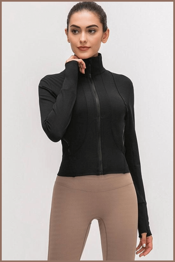 Young Girl Wears Athletic Hoodie Manufactured By X Athletic Wear The Custom Athletic Wear Manufacturer